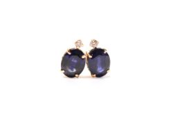 Pair of oval-cut sapphire and diamond studs, boxed. Sapphires 3.00ct. Diamonds 0.06ct
