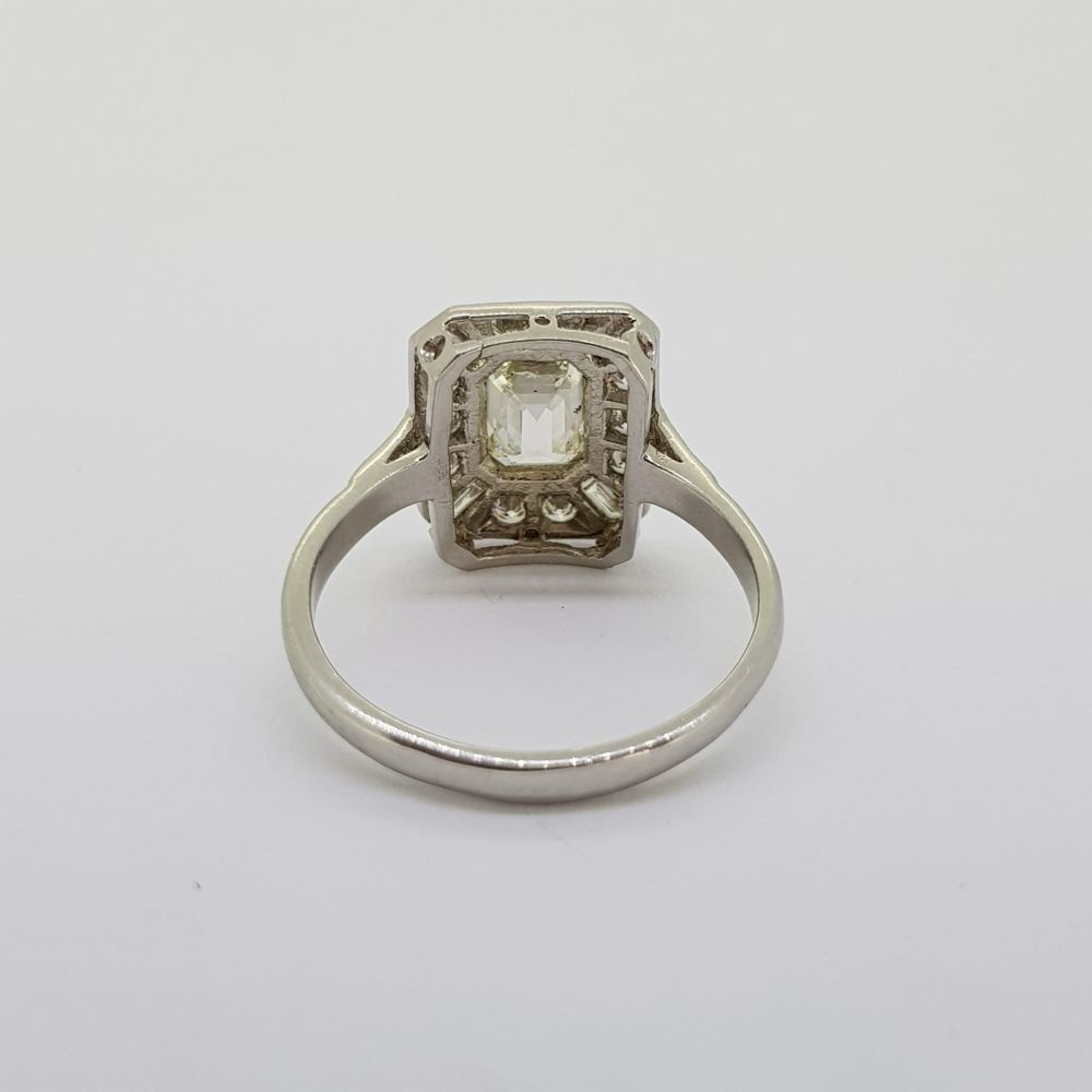 Platinum tablet ring with a central Emerald cut diamond of approximately 1.01cts. The surround of - Image 3 of 3