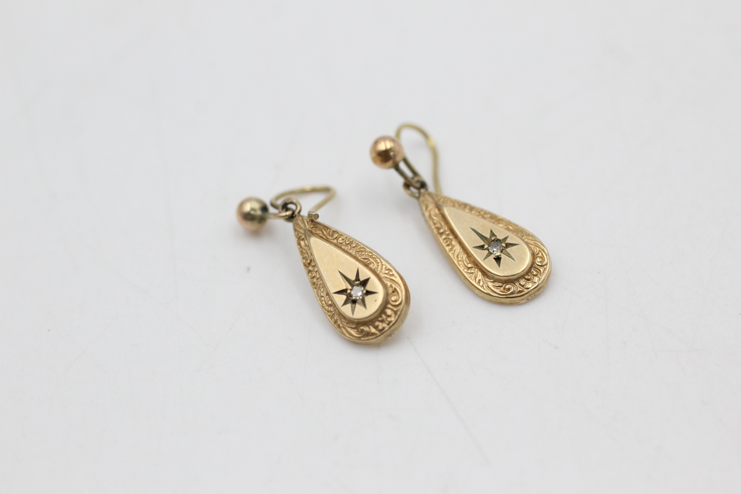 9ct gold diamond ornate flush set drop earrings (1.5g)