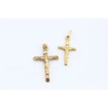 2 x 9ct gold crucifix pendants 3.7 grams gross