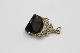 9ct gold ornate smokey quartz fob (6.9g)