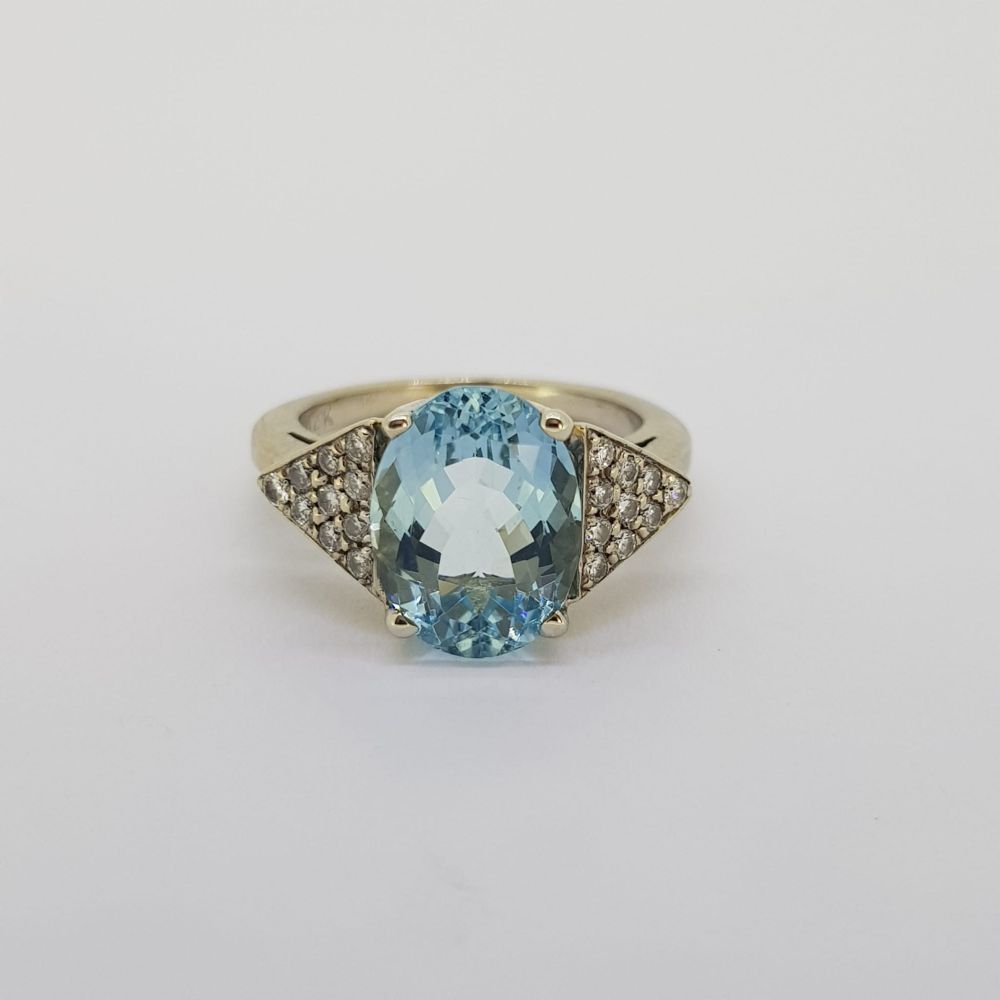 14 carat white gold Aquamarine and diamond ring. Aquamarine approximately 3 cts, total diamonds