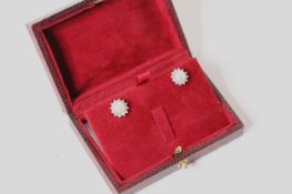 Pair of 9ct white gold pearl and diamond halo star earrings, boxed