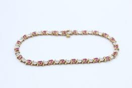 9ct gold diamond & ruby tennis bracelet (7g)