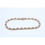 9ct gold diamond & ruby tennis bracelet (7g)