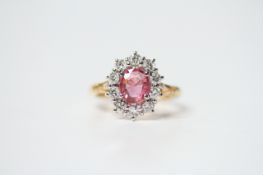 18ct yellow gold oval ruby and diamond cluster ring. Ruby 1.50ct approx. Diamonds 1.00ct approx