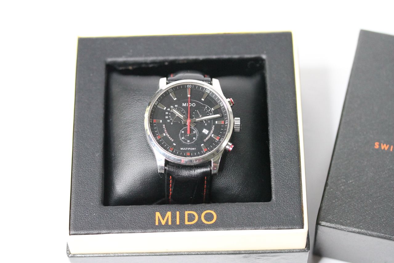 MIDO MULTIFORT CHRONOGRAPH QUARTZ BOX AND PAPERS 2011, circular black dial with three subsidiary - Image 2 of 4