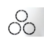 3x ROLEX SUBMARINER 16610 BLACK BEZEL INSERTS, group of 3 16610 Rolex Submariner bezel inserts,