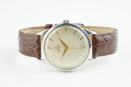 GENTLEMENS GUBELIN IPSOMATIC WRISTWATCH, circular patina dial with gold hour markers and hands, 35mm