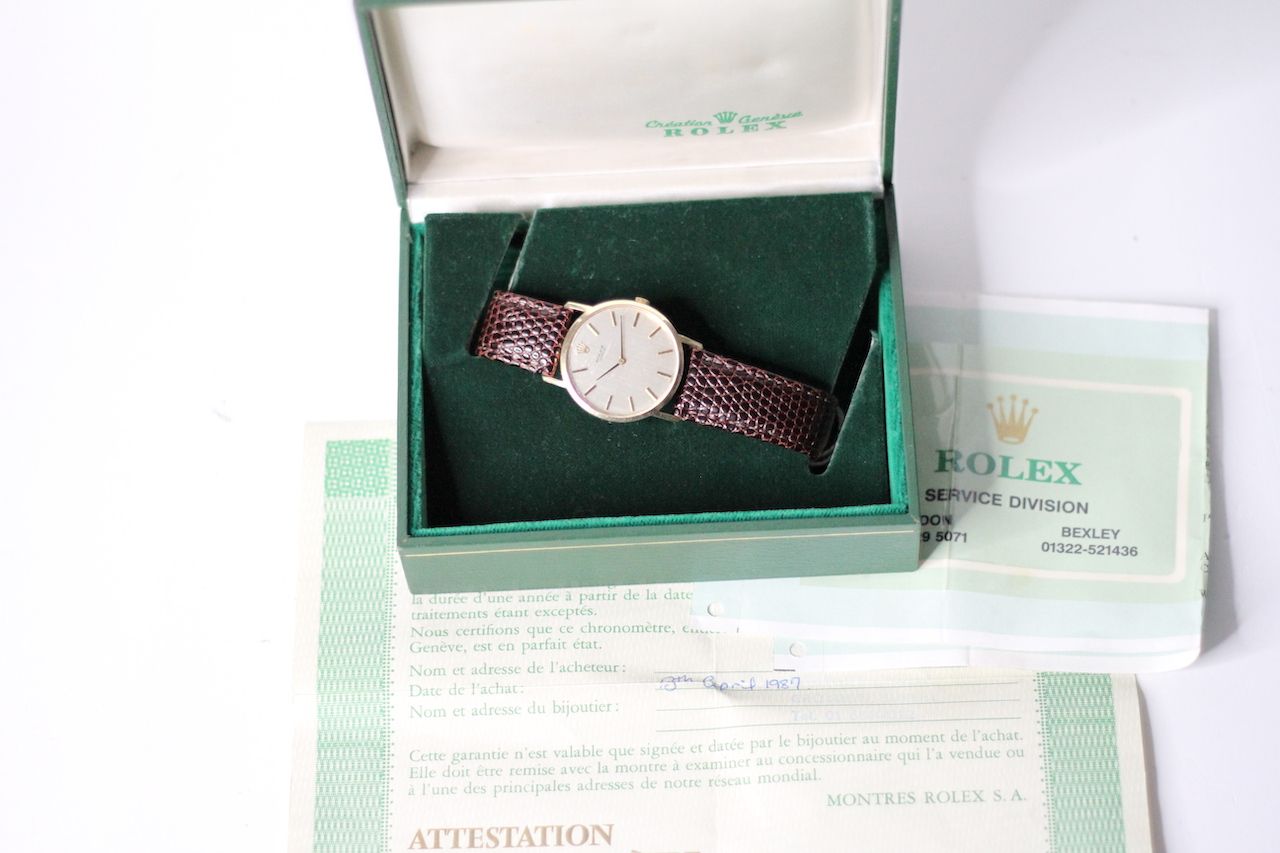 VINTAGE 18CT ROLEX MANUAL WIND BOX AND PAPERS 1987, circular silver dial with baton hour markers,