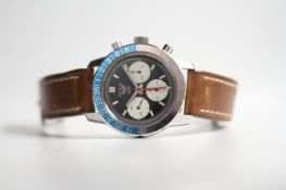 VINTAGE HEUER AUTAVIA GMT CHRONOGRAPH 'PEPSI' BEZEL REFERENCE 2446C, circular black dial with