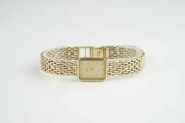 LADIES MARVIN DIAMOND 9CT GOLD COCKTAIL WATCH, rectangular two tone dial with stick hour markers and