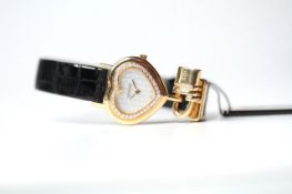 LADIES 18CT CORUM HEART SHAPED DIAMOND BEZEL QUARTZ WATCH, heart shaped mother of pearl dial with