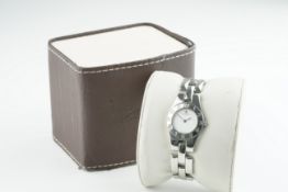 LADIES BAUME & MERCIER NEW LINEA WRISTWATCH W/ BOX, circular white dial with an hour marker bezel