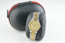 GENTLEMENS TISSOT SEASTAR DATE WRISTWATCH W/ TRAVEL POUCH, circular gold dial with stick hour