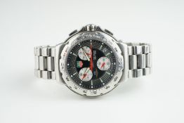 GENTLEMENS TAG HEUER INDY 500 CHRONOGRAPH WRISTWATCH, circular triple register black dial with