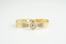 LADIES ROLEX ORCHID 18CT GOLD COCKTAIL WATCH, circular silver dial with arrow head hour markers
