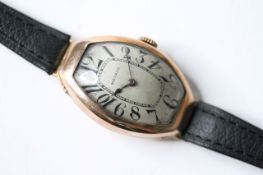 RARE 14CT OVERSIZED MOVADO TONNEAU CASED ART DECO WATCH CIRCA 1910-1920, exploding Roman numeral