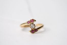 Ruby & Diamond Twist Ring, stamped 18ct yellow gold, size O, 2.6g.