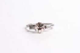 1950s Solitaire Ring, claw set, baguette cut diamond shoulders, platinum, estimated total diamond