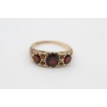 9ct gold vintage garnet seven stone gypsy setting dress ring (2.9g)