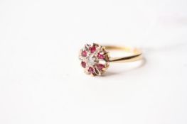 Ruby & Diamond Cluster Ring, stamped 18ct yellow gold, size L, 3.35g.