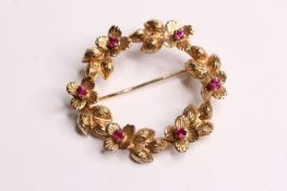 9ct yellow gold circular stone set brooch