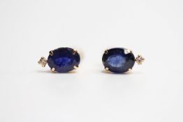 Pair of oval-cut treated sapphire and diamond studs, boxed. Sapphires 3.00ct. Diamonds 0.06ct