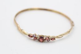 9ct gold amethyst, garnet & diamond stylised bangle (3.8g)