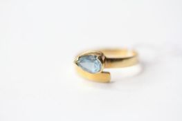 Aquamarine Twist Ring, stamped 18ct yellow gold, size N, 3.3g.