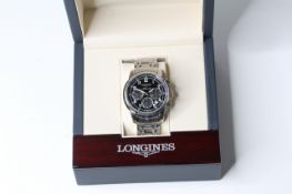 LONGINES AUTOMATIC CHRONOGRAPH WITH BOX, circular black dial with arabic numeral hour markers,