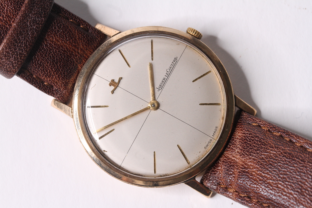 VINTAGE 9ct JAEGER LECOULTRE DRESS WATCH , circular cream dial quartered with gold baton hour
