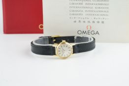 LADIES OMEGA GOLD PLATED COCKTAIL WATCH W/ GUARANTEE PAPERS, circular silver dial with stick hour