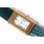 18CT ASPREY FLIP CASE WRIST WATCH WITH SERVICE PAPERS, rectangular white dial with roman numeral