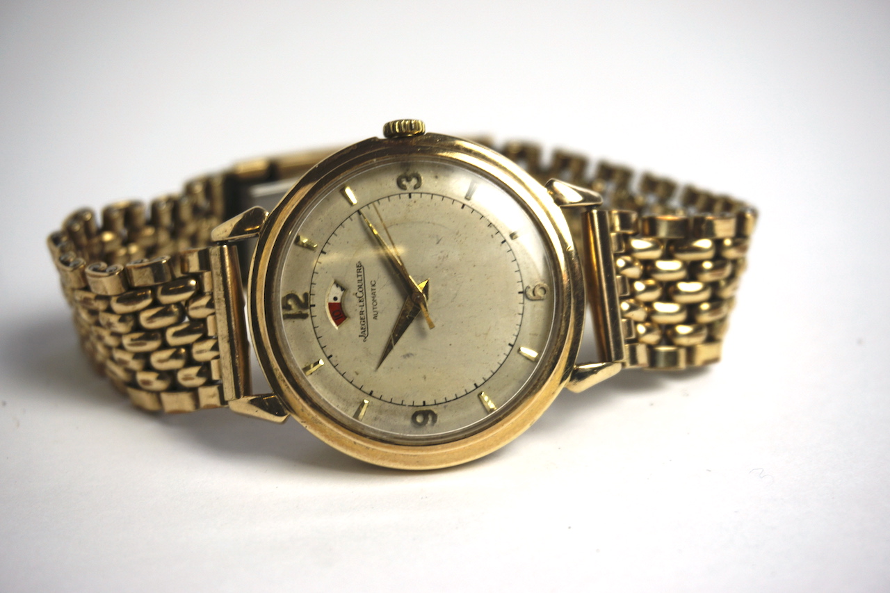 VINTAGE 9CT JAEGER-LECOULTRE POWER RESERVE, circular cream dial with baton and arabic numeral hour