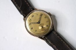 VINTAGE 9CT STERILE DIAL WRIST WATCH, circular champagne dial with arabic numeral hour markers,