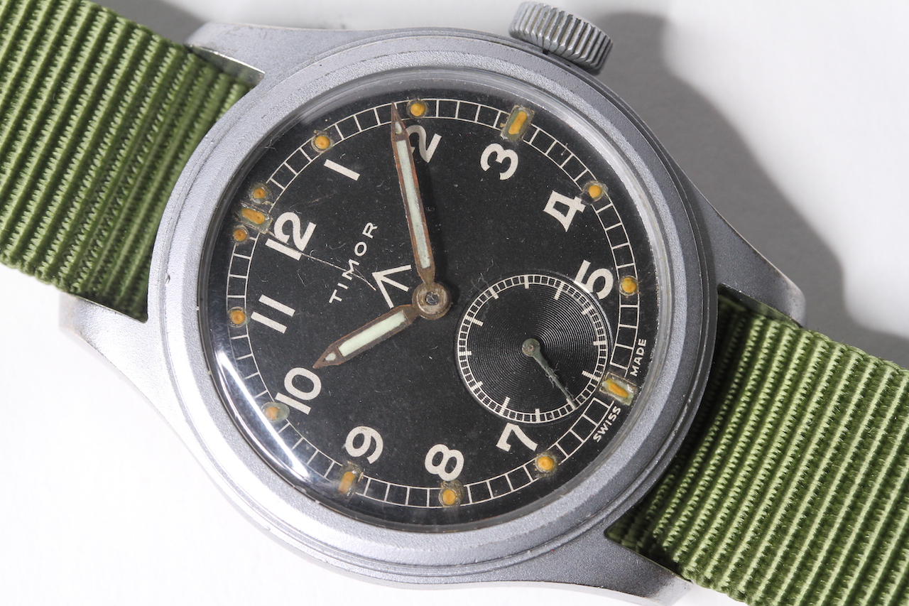 VINTAGE TIMOR WWW MILITARY WATCH WITH LEATHER BOX,, circular black dial with arabic numeral hour - Image 2 of 4