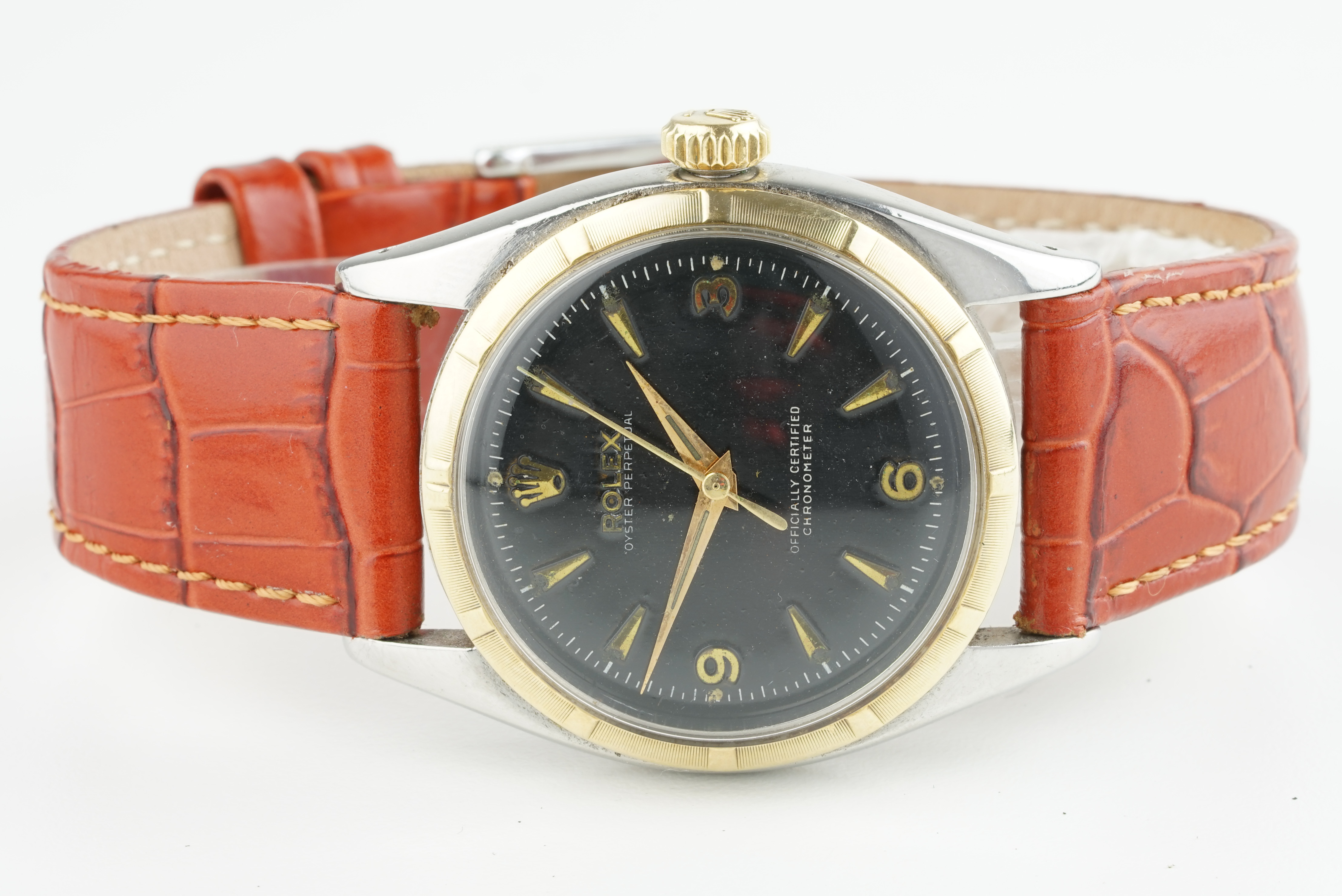 GENTLEMENS ROLEX OYSTER PERPETUAL STEEL & GOLD WRISTWATCH REF. 6581 CIRCA 1954, circular black '3