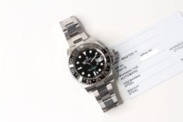 ROLEX GMT MASTER II 116710LN WITH EBAY AUTHENTICITY CARD, circular gloss black dial with applied