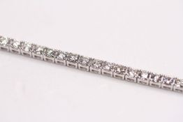 Diamond Line Bracelet, 18ct white gold, 57 diamonds totalling approximately 5.12ct total, 2 d clips,