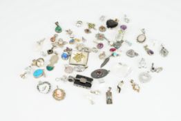 GROUP OF 50+ STERLING SILVER PENDANTS, approx. 57 sterling silver gem-set pendants, approx. weight
