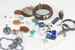 MIXED GROUP OF STERLING SILVER JEWELLERY PIECES, includes pendants, bracelets, gem set, sterling