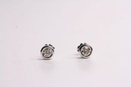 Pair of Diamond Stud Earrings, bezel set, 18ct white gold, butterfly backs, 0.60ct diamond total.