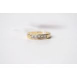 5 Stone Princess Cut Diamond Ring, 18ct yellow gold, size N, 3.7g.