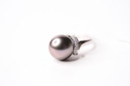 Black Pearl & Diamond Ring, stamped 18ct white gold, size M, 5g.