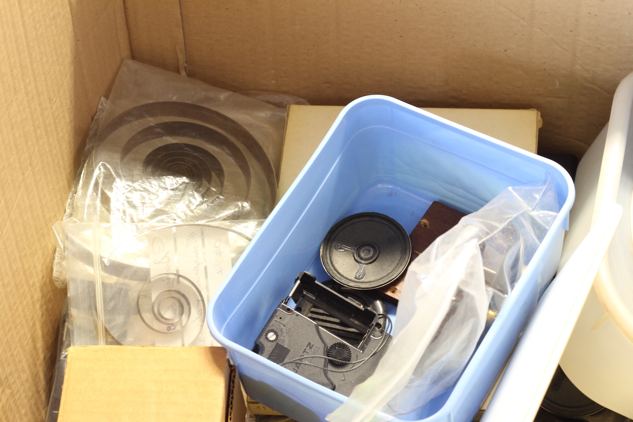 * TO BE SOLD WITHOUT RESERVE* Large box of misc clock parts including; hands, movements, springs