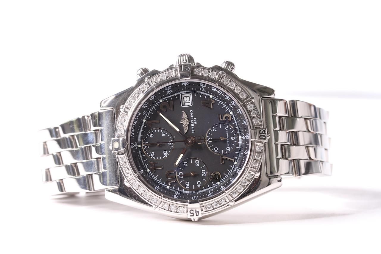BREITLING CHRONOMAT DIAMOND BEZEL WITH BREITLING CASE REFERENCE A13050.1, circular black dial with