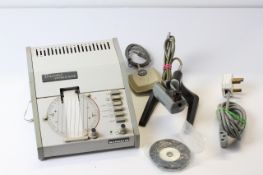 * TO BE SOLD WITHOUT RESERVE* A vintage Tickoprint compact Timing Machine, with plug, clamp, tape,