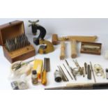 * TO BE SOLD WITHOUT RESERVE* A box of watch makers tools including vintage tools, clamps, files,
