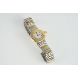 LADIES CARTIER BAIGNOIRE RHONDE 18CT GOLD WRISTWATCH REF. 8057, circular off white dial with gin